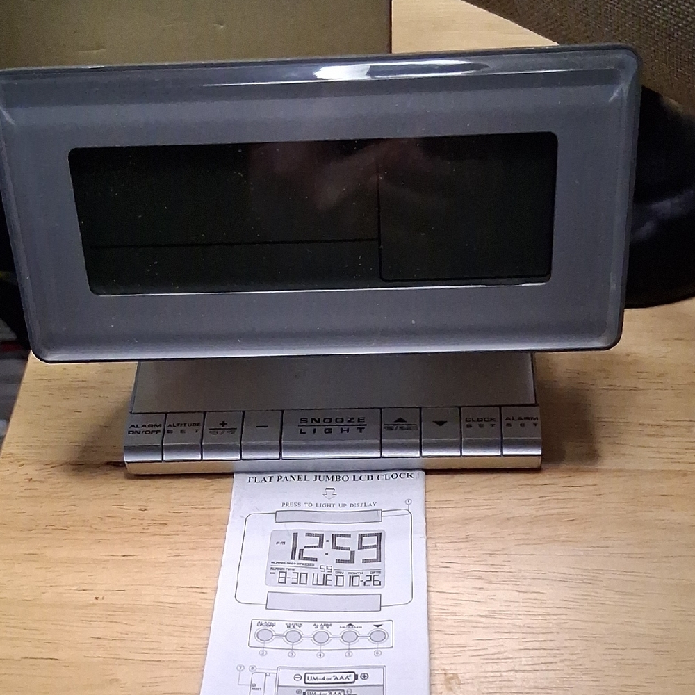 Sleek Silver Digital Alarm Clock with LCD Display. New In Package.